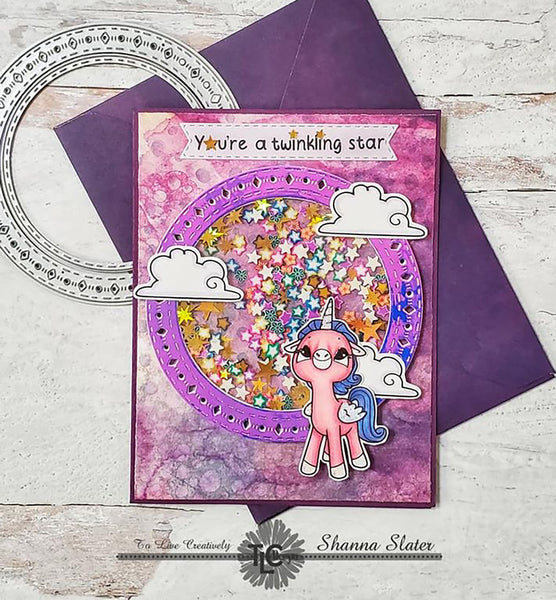 Shanna from TLCDesigns.shop has created a shaker card of your purpleicious dreams witht he Aztec sunshine die and the Alicorn Polymer stamps!