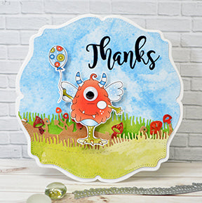 What a way to celebrate with One Eyed Harry digi stamp on a card designed with blue skies, green grass, colorful balloons and mushrooms too! Say Thanks with the EZ Salutations stamp set from TLCDesigns.shop