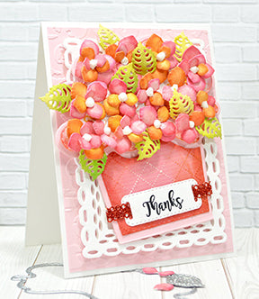 The Cherry On Top die set made into an adorable pink and orange flower pot full of hydraengea flowers popped up on the Rectangle die saying thanks from TLCDesigns.shop