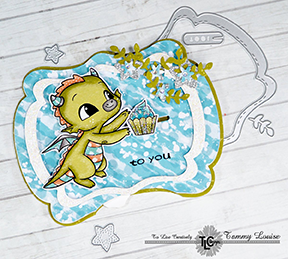 Happy the Dragon is sliding over to the center of the card to catch his cupcake! The See you in the Center interactive die from TLCDesigns.shop and it's wheel is helping him!