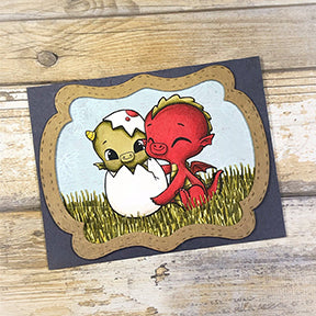 Happy the Dragon is hugging Greeting the Dragon because he's come out of his shell on this adorable Copic colored greeting card! The See You in the Center die frame and stamp illustrations are from TLCDesigns.shop