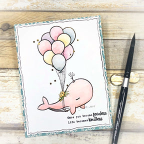 The Fancy Fins digital stamp set has a Whale that is being carried away with the floating balloons and a rope in this starry dreamy foiled card project by TLCDesigns.shop