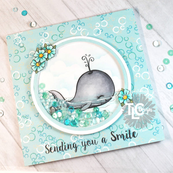 The Fancy Fins digital stamp set and the Sun Shiny Days paper exclusively from TLCDesigns.shop create this gorgeous shaker card full of oceanic bubbles and that wonderful turquois colors! 
