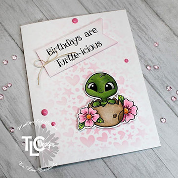 Marilyn the dt at tlcdesigns.shop has created a perfectly delightful little turtle-icious project with stencils and drops in pink