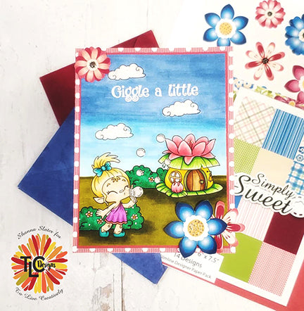 Giggle a little is what this pretty little card says from TLCDesigns.shop.  The Toga and Bubbles polymer stamp image is in the troll village doing what she does best!  Blowing Bubbles!  This Simply Sweet paper pack included cut out flowers perfect additions to any project