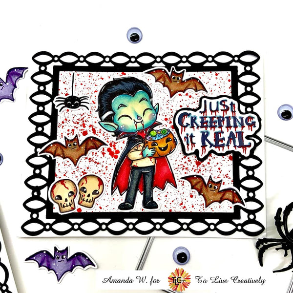 Speckled with blood colored paint, this card is full of fun and horror but Drake, the digital stamp from TLCDesigns.shop is front and center with his devilishly fun glowing skin and holding his yummy take from the nights tricks or treating!  Just Creeping it Real! 