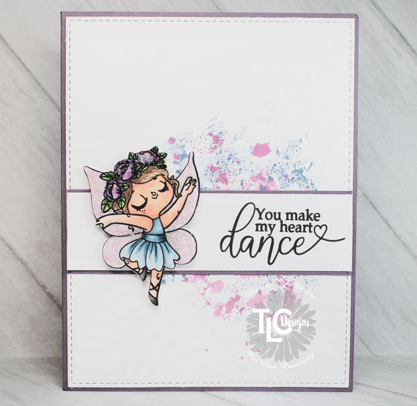 The Exclusive Tip Toe Fairy Dance stamp from TLC Designs makes for the perfect image to make your heat dance! The simple but artsy project from DT Marily is a perfect example!