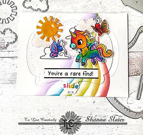 The rainbow colored Alicorn is gallopping over to his butterfly friend in the center of this greeting card just under the sun and over the rainbow! Stamps and dies by TLCDesigns.shop